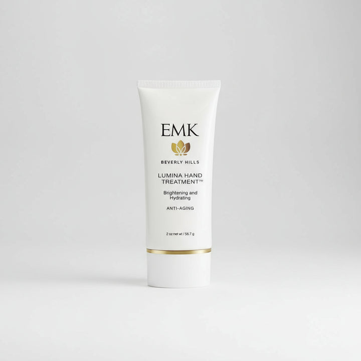A bottle of Lumina Hand Treatment, an anti-aging hand cream.