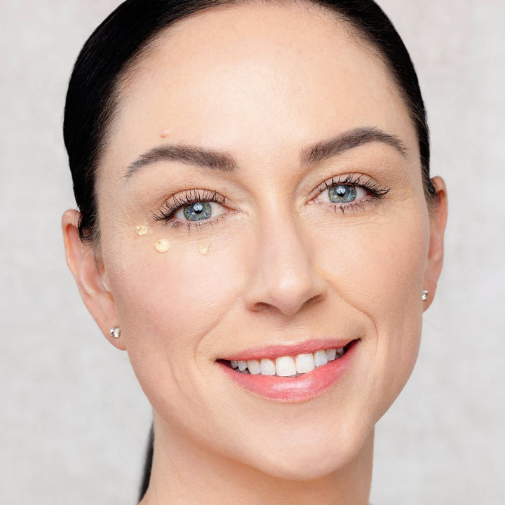 Model with Beam Eye Gel applied to under eye area