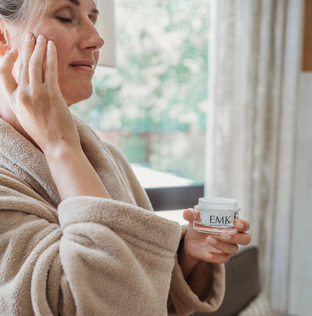Model applying Supra Face Cream 