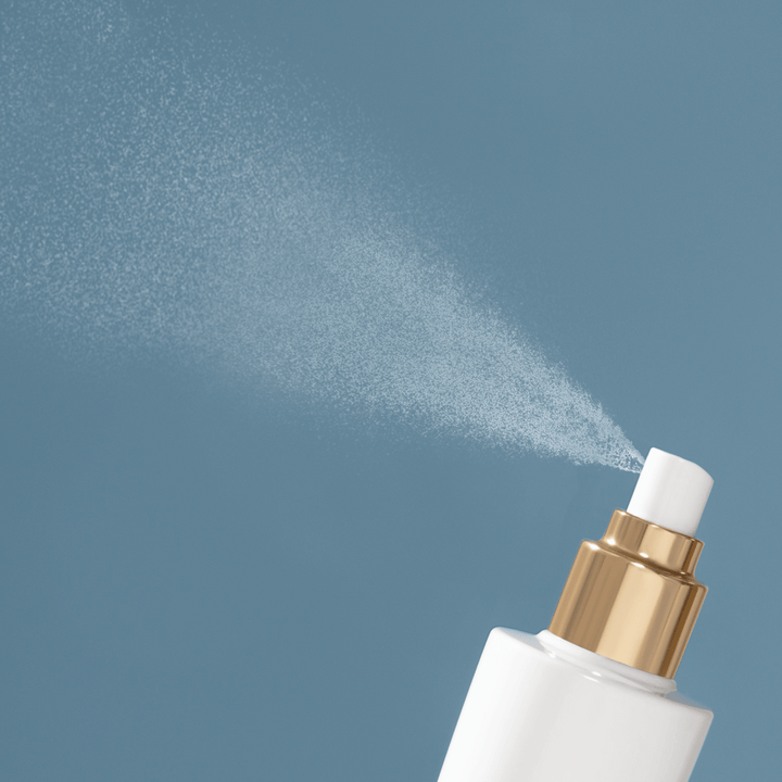 Bloom Toner spray bottle in action by EMK Skincare