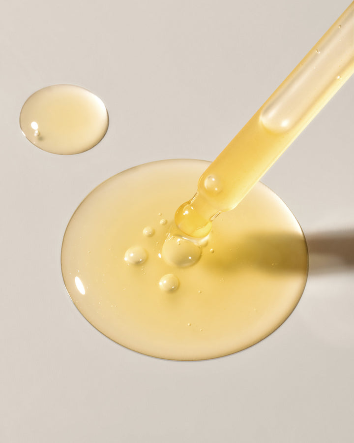 Cx3 Gold Serum dropper texture swatch by EMK Skincare
