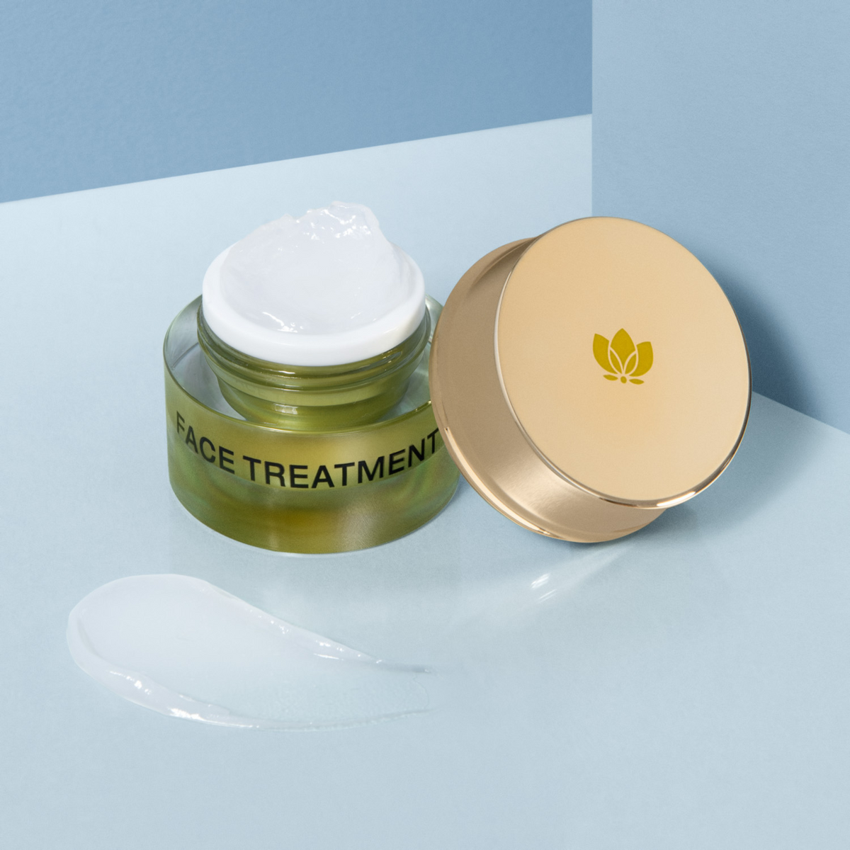 Face Treatment open jar with texture swipe by EMK Skincare