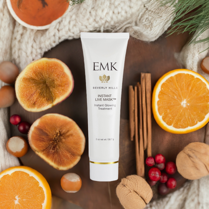 Instant Live Mask tube styled with citrus and cinnamon by EMK Skincare