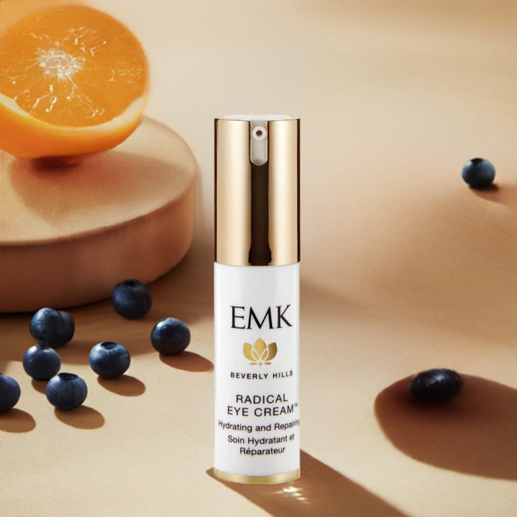 Radical Eye Cream bottle with orange and blueberries by EMK Skincare