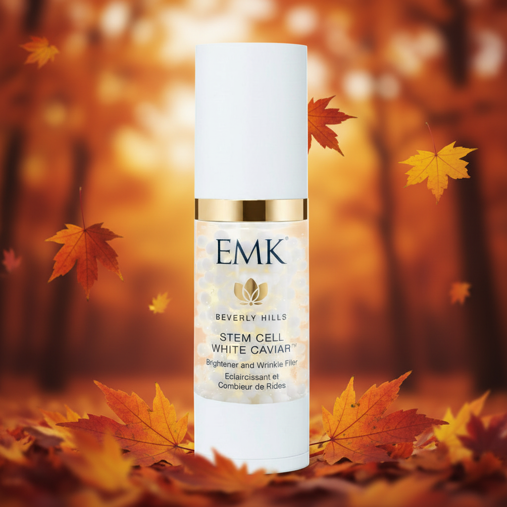 Stem Cell White Caviar bottle in a fall leaves scene by EMK Skincare