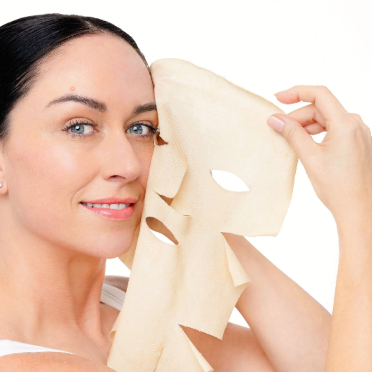 Model peeling off Texal Sheet Mask by EMK Skincare